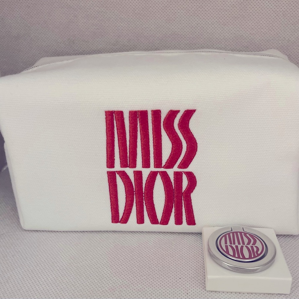 MISS DIOR MAKEUP POUCH AND MISS DIOR PHONE RING! BOTH NEW AND NEVER USED!
